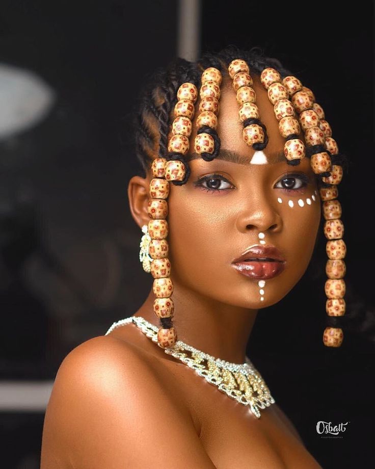 Cultural Fulani braids with beads and jewelry, top African braiding styles Houston