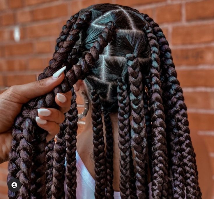 Close-up of neat box braids, illustrating box braids care and braids maintenance Houston